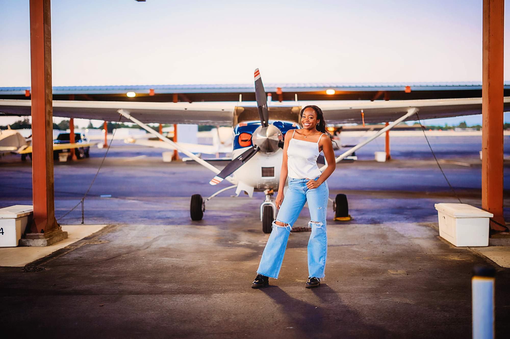 Outdoor senior photos at an airport