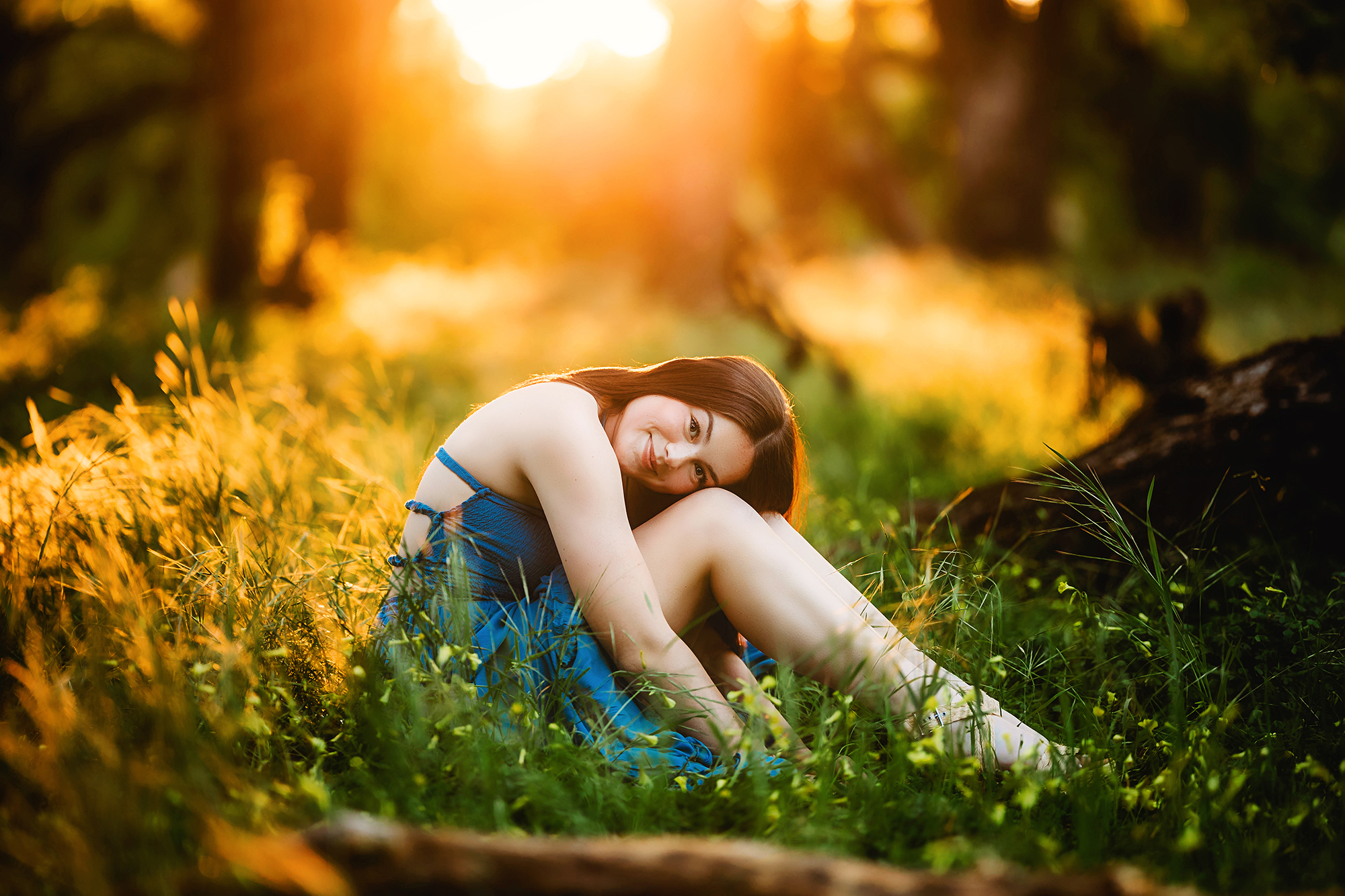 outdoor senior photos in the flowers at golden hour