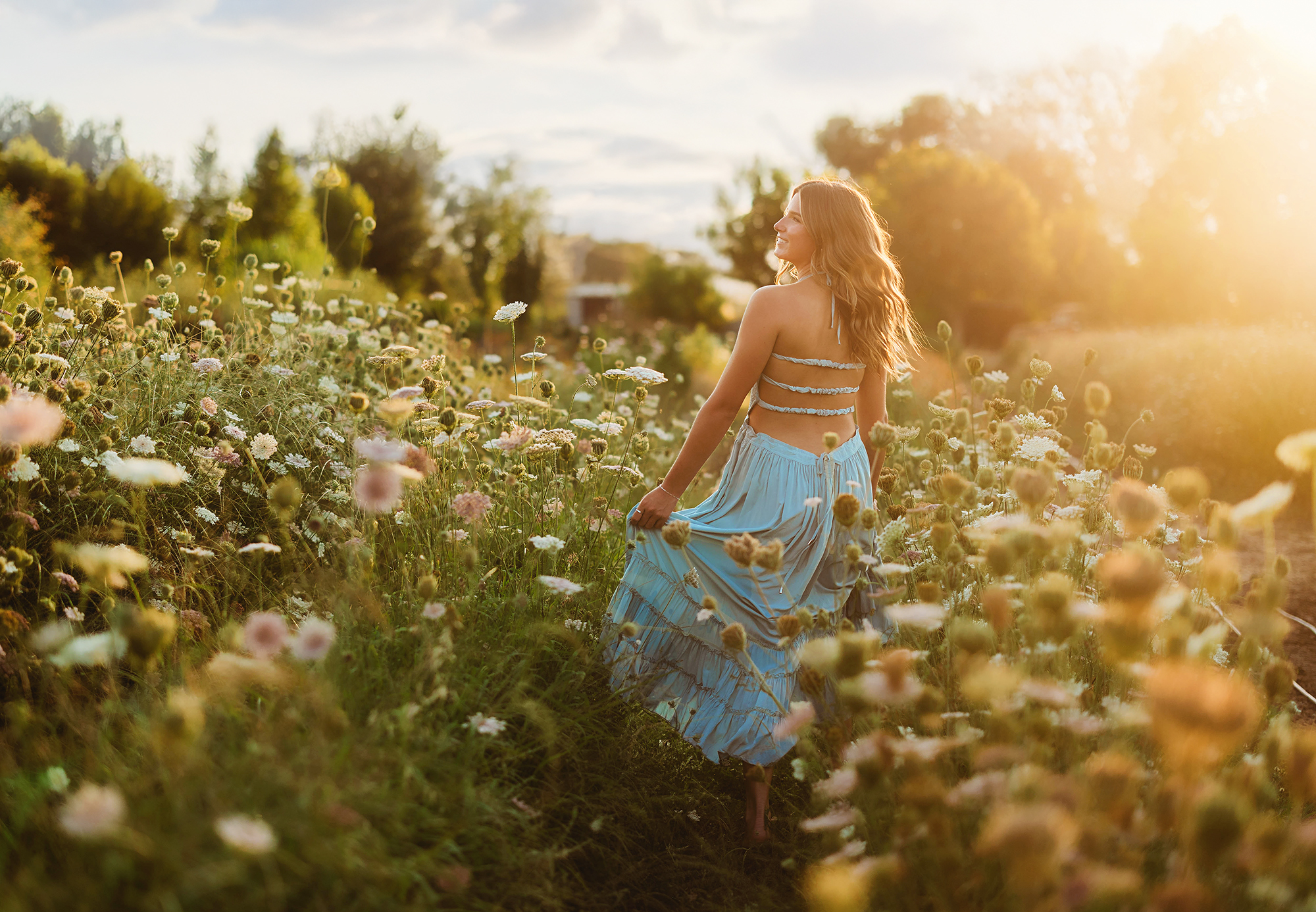 Senior photos in spring in wildflowers