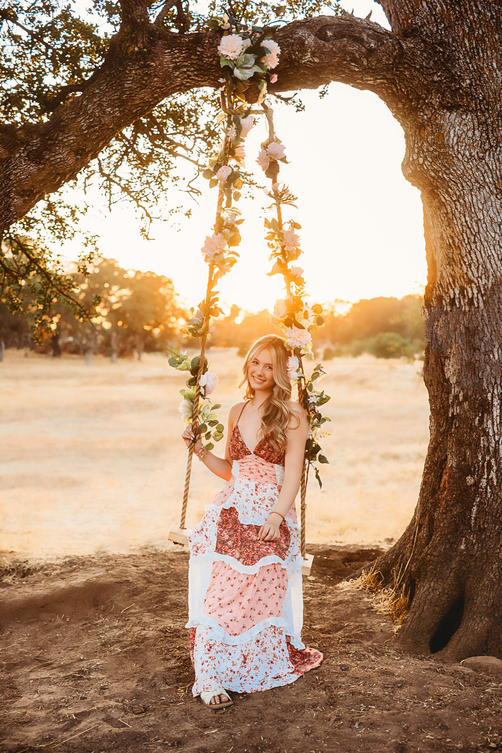 Outdoor sunset photos for high school senior grads